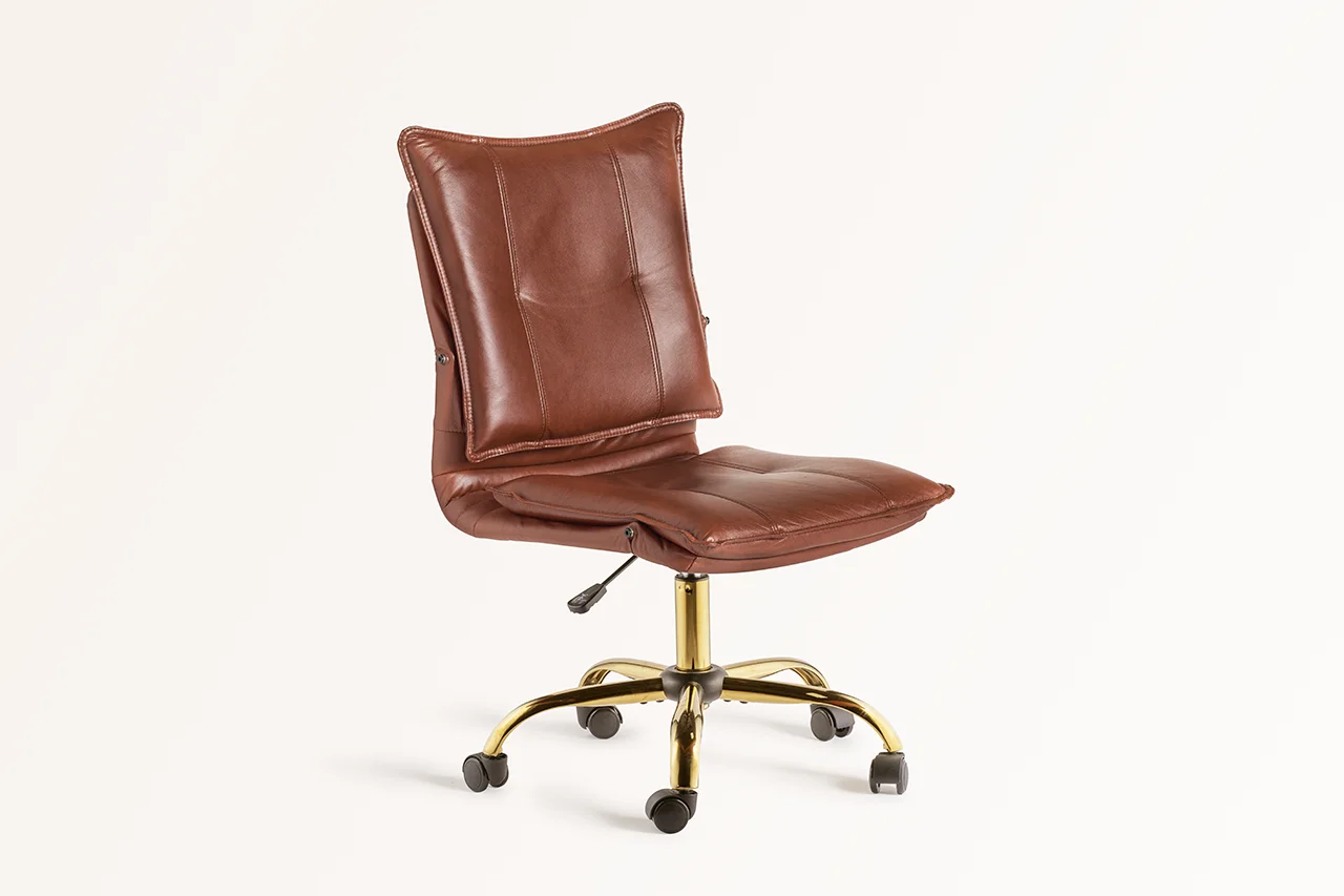 office chair product photography, brown and gold leather chair